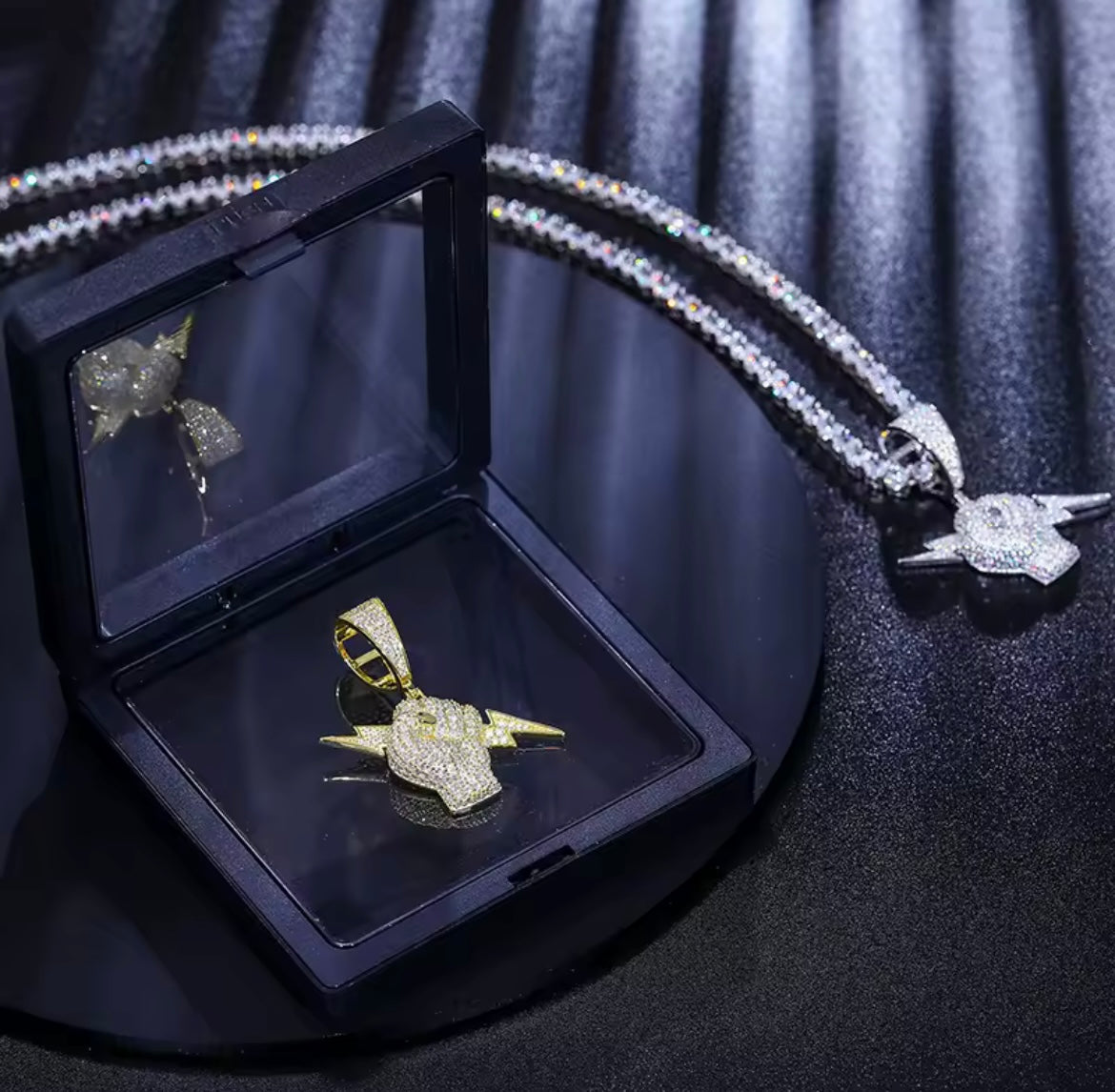 Holding Lightning Bolt Pendant