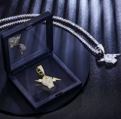 Holding Lightning Bolt Pendant